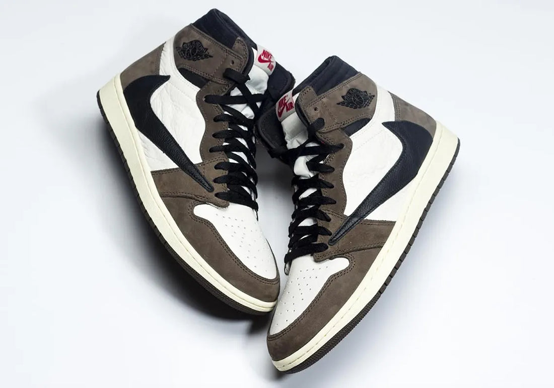 Travis Scott x Air Jordan 1 with reverse swoosh and brown suede detailing – available at Raf Sneakers Trieste